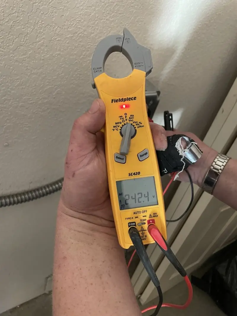 Voltage testing with clamp meter during Generator Installation in Cambridge